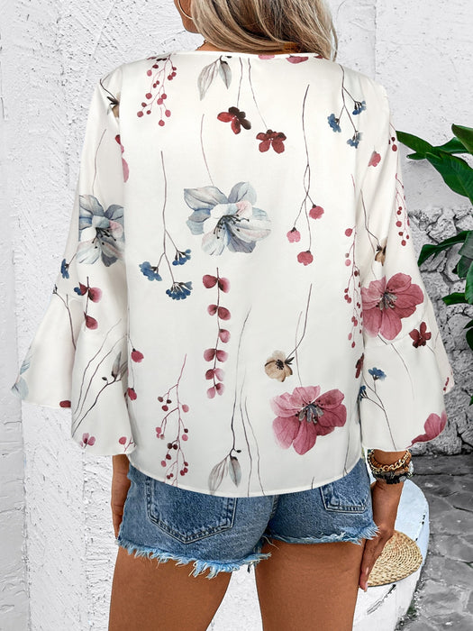 Honey Ruffled Printed V-Neck Half Sleeve Blouse  Jessie Knowles