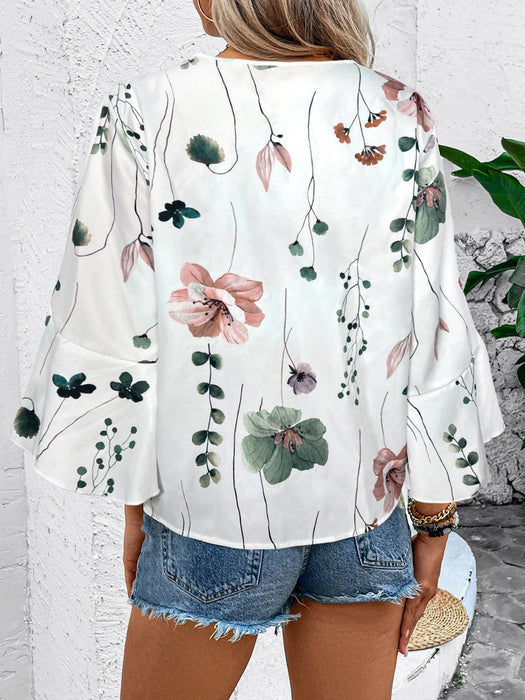 Honey Ruffled Printed V-Neck Half Sleeve Blouse  Jessie Knowles