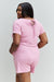 Zenana Chilled Out Short Sleeve Romper in Light Carnation Pink  Jessie Knowles